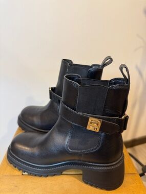 Steve Madden Black Chelsea Boot with Gold Buckle